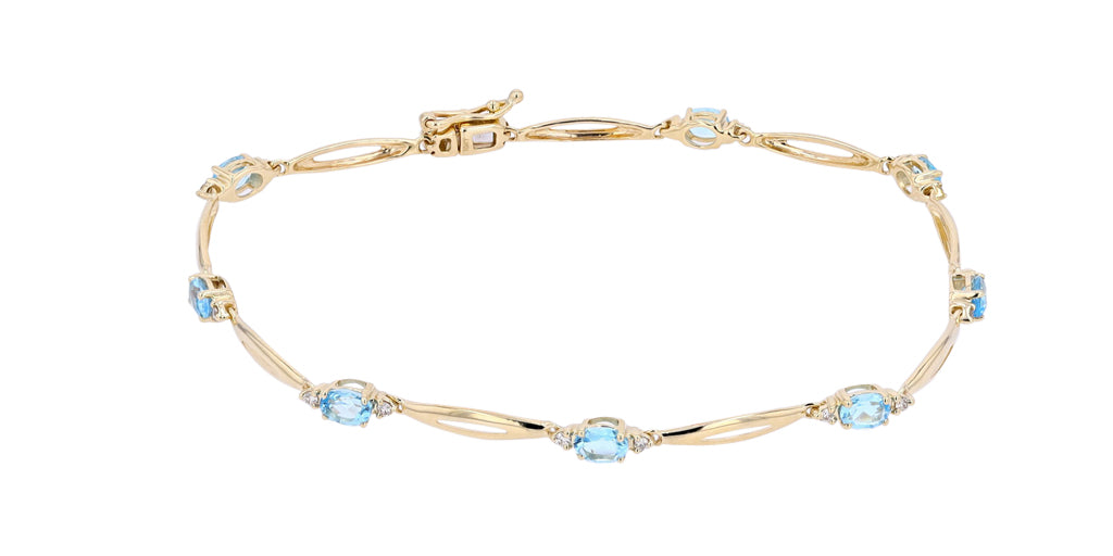 10K YG 0.14 CTW Diamonds 1.50 CTW Swiss Blue Topaz Bracelet