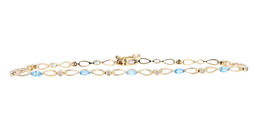 10K Yellow Gold 0.11 CTW Diamond 1.00 CTW Blue Topaz Bracelet