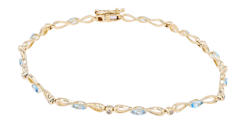 10K Yellow Gold 0.11 CTW Diamond 1.00 CTW Blue Topaz Bracelet