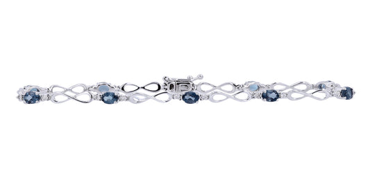 10K White Gold 0.18 CTW Diamond 1.80 CTW London Blue Topaz Infinity Bracelet