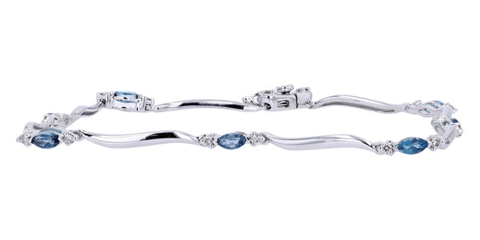 10K White Gold 0.14 CTW Diamond 0.62 CTW London Blue Topaz Bracelet